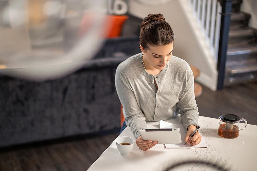 Student taking an at home exam from her phone